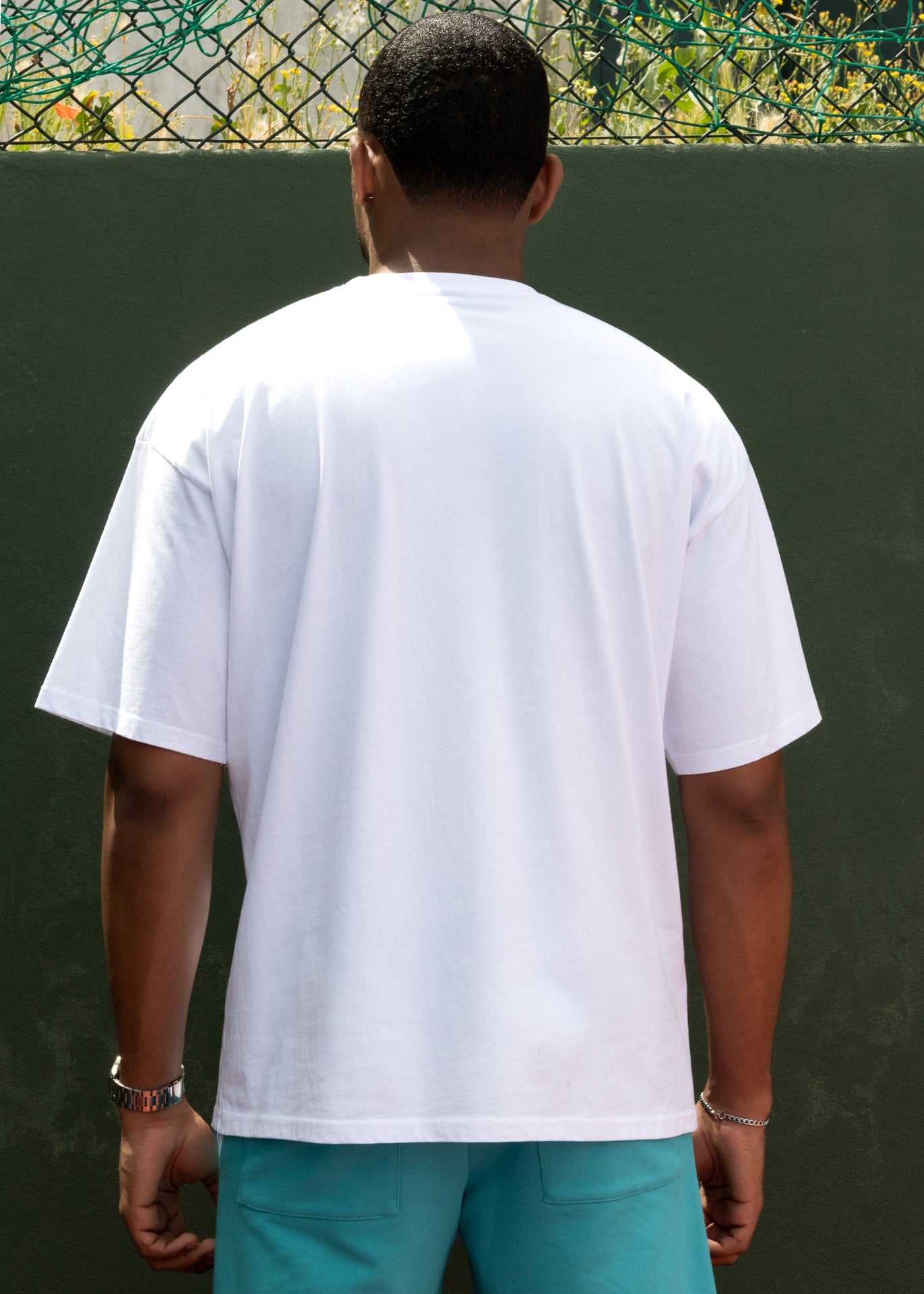 T-shirt oversize com bolsos em capulana